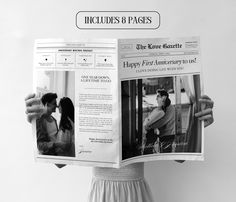 a woman holding up a newspaper with photos on it