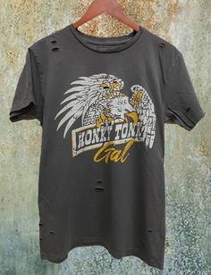 Country Deep Honky Tonk Gal 1980's Distressed Unisex T shirt  vintage wash black Throw back vintage tee from 1980's 40 Singles Jersey 100% Cotton Premium quality ringspun and compacted cotton Fine Cotton Jersey that is pigment dyed for a more vintage look Features tears and destroyed features at neck and on body Each piece is unique as this process is done by hand! 3.8 oz Made In USA Every garment dye item can be a slightly different shade in color since this is a laundry dye process. Enjoy its Vintage Washed Black T-shirt With Letter Print, Vintage Washed Black Screen Printed Tops, Vintage Distressed Crew Neck Top, Vintage Acid Wash Distressed T-shirt, Vintage Washed Black Distressed T-shirt, Vintage Washed Black Top With Letter Print, Vintage Black Washed Tops, Vintage Washed Black T-shirt With Screen Print, Retro Distressed Washed Black T-shirt