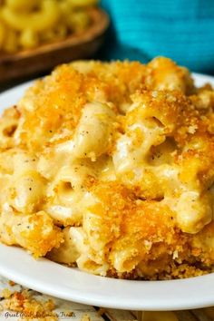 a white plate topped with macaroni and cheese