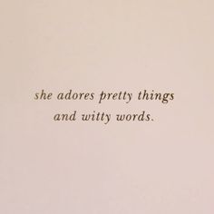 the words are written in cursive writing on a piece of paper that says, she adores pretty things and witty words