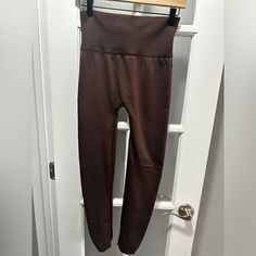 Nwot Brown Legging Style Joggers. Thicker Lined Legging Perfect For Fall And Winter. No Size Tag, Waist Measures 13 Inches. High Stretch Brown Loungewear Bottoms, High Stretch Brown Bottoms For Loungewear, Brown High Waist Stretch Activewear, Stretch Brown Yoga Pants For Fall, Fall Stretch Brown Yoga Pants, Brown Tight Full-length Bottoms, Brown Full Length Yoga Pants For Fall, Tight Full-length Brown Bottoms, High Waist High Stretch Brown Leggings