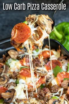 the pizza casserole is loaded with meat, mushrooms, and cheese on it