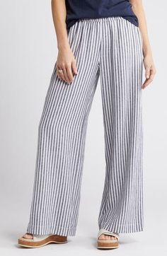 Breezy stripes adorn these lightweight linen-blend pants cut with flowy wide legs and topped with a comfortable elastic waist. 31" inseam; 25" leg opening; 11 1/2" front rise; 15" back rise (size Medium) Elastic waist Front slant pockets; back welt pockets 55% linen, 45% rayon Machine wash, tumble dry Imported Blue Striped Pants Outfit, Pants Nordstrom, Linen Pants Outfit, Workwear Jeans, Runway Outfits, White Linen Pants, Linen Blend Pants, Striped Tie, Summer Staples