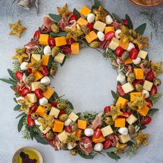 a wreath made out of cheese and other food