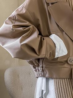 Chic vegan leather short trench with belted waist and eyelet button details. Wide oversized collar. Model is in MINUSEY ONE SIZE. * MINUSEY ONE SIZE = EU 34-38, US 2-6* 100% PU Leather* Dry clean* Made in Korea - Model Height: 169cm/5'6" (US2, EU34) Luxury Leather Jacket With Hidden Buttons For Spring, Luxury Oversized Outerwear With Double Button Closure, Luxury Fall Outerwear With Zip Fly, Collar Model, Oversized Collar, Leather Short, Early Spring Outfits, Current Fashion Trends, Leather Shorts