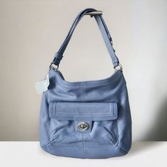 Coach Penelope D1276- F19045 Leather Lilac Blue Hobo Shoulder Handbag Purse New Fantastic Purse - New With Tags. 13" Wide, 11" Tall, Strap Drops 10"-20" (Adjustable) Convertible - Extend Strap For Crossbody. Style F1220-F19045 Zip Top Closure Convertible Strap (Shoulder Or Crossbody) Pink Fabric Lining Silver Tone Twist Lock And Flap Front Pocket Will Ship With Dust Bag Msrp $328 Features: Hobo Shoulder Size: Womens Medium *****Condition: New With Tags - Small Spot On Zipper **** Fantastic Purse Blue Top Handle Hobo Bag With Detachable Strap, Blue Hobo Bag With Handle Drop For Everyday Use, Blue Soft Leather Shoulder Bag For Errands, Modern Light Blue Bags For Everyday Use, Blue Hobo Bag With Detachable Strap For Shopping, Modern Blue Hobo Bag For Errands, Elegant Blue Hobo Bag For Everyday Use, Modern Light Blue Bag For Everyday Use, Blue Hobo Bag With Detachable Strap And Top Handle