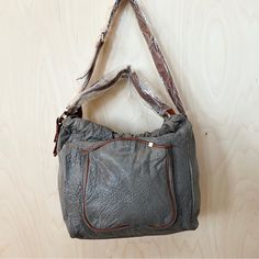 Anthropologie Manzanilla Hobo Bag By Schuler & Sons Philadelphia. Buttery Soft Grey Textured Genuine Leather (The Stock Photos Show An Olive Color Bag, The Bag For Sale Is Grey) Adjustable Strap One Outer, Three Inner Pockets Magnetic Snap Closure Leather, Cotton Lining Approx Measurements: 9'h, 10"W, 5"D 15" Strap Drop **Nwot** Taupe Shoulder Bag For Travel, Taupe Shoulder Bag With Removable Pouch For Travel, Taupe Shoulder Bag For Daily Use, Taupe Double Handle Bags For Daily Use, Taupe Double Handle Bag For Daily Use, Taupe Leather-handled Rectangular Shoulder Bag, Taupe Tote Bucket Bag, Everyday Taupe Tote Bucket Bag, Taupe Tote Bag With Leather Handles