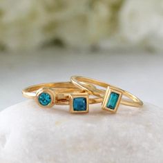 December Birthstone Ring in Gold.  Stackable Mothers Ring with Gold Stackable Rings With Gemstone Accents As A Gift, Gold Stackable Rings With Gemstone Accents For Gift, Gold Topaz Birthstone Promise Ring, Gift Turquoise Sapphire Ring With Accent Stones, Gold Stackable Rings With Birthstone In Cubic Zirconia, Gold Topaz Birthstone Ring Gift, Yellow Gold Topaz Birthstone Ring For Gift, Gold Rings With Topaz Birthstone, Yellow Gold Topaz Birthstone Ring As Gift