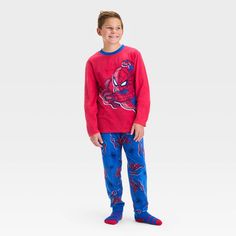 Get your superhero ready for bed by dressing them in the Spider-Man 2-Piece Cozy Pajama Set and Socks. This red pajama set includes a red long-sleeve sleep shirt and a pair of pajama pants, both with a Spider-Man print, as well as matching red and blue socks for a cozy look. Made from soft fabric, the pieces are comfortable and warm to wear. Winter Character Print Loungewear Sleepwear, Winter Sleepwear With Character Print, Winter Loungewear Sleepwear With Character Print, Playful Red Sleepwear For Sleepover, Playful Red Sleepwear For Sleepovers, Red Character Print Loungewear Sets, Red Character Print Sleepwear For Sleepover, Red Winter Sleepover Sets, Red Pajamas