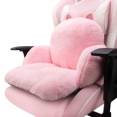 a pink chair with a large stuffed animal on it's armrest and seat cushion