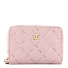 This is an authentic CHANEL Caviar Quilted Zip Coin Purse in Light Pink. This petite wallet is crafted of pink caviar leather. This round purse features a wrap-around zipper and a gold CC logo on the front. The zipper opens to a matching pink fabric interior. Round Purse, Chanel Wallet, Pink Chanel, Chanel Caviar, Light Pink Color, Pink Brand, Cc Logo, Pink Fabric, Pretty Things