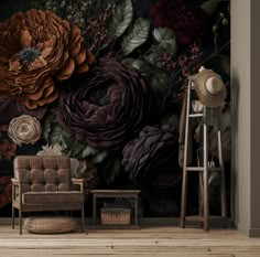 a living room with a chair and wallpaper that has large flowers on the wall