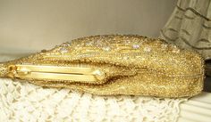 "I am so excited to be offering this SO beautiful, extremely well made, vintage Art Deco high end designer \"Walborg\" crystal rhinestone encrusted beaded gold lame flapper purse perfect for the Bride. This bag is in PRISTINE vintage condition! (It appears to be unused.) If you could see this rhinestone encrusted beaded purse in person you would know that photos are not doing it justice as they don't begin to capture the unbelievable sparkle adequately; it absolutely shimmers as it catches the l Vintage Gold Evening Bag For Wedding, Vintage Handheld Evening Bag For Wedding, Vintage Handheld Evening Bag For Weddings, Antique Style Evening Bag For Weddings, Elegant Clutch Evening Bag For Vintage Events, Vintage Gold Handheld Clutch, Antique Rectangular Evening Bag For Wedding, Vintage Wedding Clutch Bag, Antique Clutch For Wedding