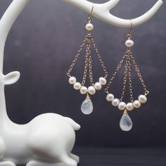 Elegant Wedding Moonstone Earrings, Pearl White Chandelier Earrings Made Of Pearl For Gifts, Elegant Moonstone Pearl Drop Jewelry, Elegant Pearl Drop Moonstone Jewelry, Elegant Moonstone Jewelry With Pearl Drop, Pearl White Chandelier Earrings With Pearl Charm, Pearl White Chandelier Earrings With Pearl Charm As Gift, Elegant Moonstone Earrings As Gift, Gift Pearl Briolette Earrings