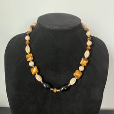 A beautiful jasper, tiger's eye, black onyx, and glass vintage beaded necklace. The weight is 52 grams and the length is 18 inches. Beige beads are Jasper, darker brown beads are tiger's eye, and black beads are black onyx. The small light honey-colored beads between the stone beads are glass. The screw clasp appears made of brass. Please see pictures for condition. Southport Nc, Vintage Beads Necklace, Tigers Eye, Tiger's Eye, Small Light, Glass Bead Necklace, Eye Black, Black Beads, Tiger Eye