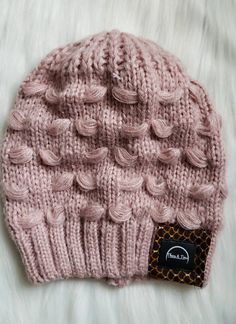 Rock and stay stylish all through the cold season in our cozy beanie with a Touch of African Prints. How cool is it to still have a piece of the vibrant African Prints with you even in the cold season.  Logo Attached African Fabric Warm Knit Winter Hat Faux Leather Logo Patch This beanie is a Theos and Tims branded item Pink Ankara, Cozy Beanie, Knit Winter Hat, African Prints, Cold Season, Leather Logo, African Fabric, Winter Knits, Winter Hat