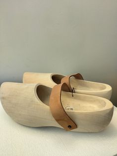 Hand Made Wooden Shoes Wooden Slip-on Mules, Casual Wood Closed Toe Clogs, Casual Closed Toe Wooden Clogs, Wooden Clogs With Round Toe, Wooden Mules With Rubber Sole And Round Toe, Wooden Clogs With Round Toe And Wooden Heel, Casual Closed Toe Clogs With Rubber Heel Cap, Casual Wood Mules With Round Toe, Rustic Slip-on Clogs With Wooden Heel