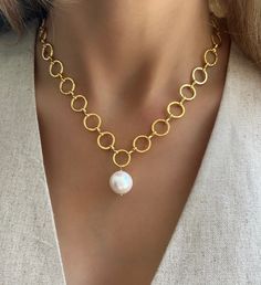 Indulge in the luxurious elegance of our Oceanside Baroque Pearl Necklace. The 18k gold plated circular design accentuates the natural beauty of the baroque pearl, making it a unique and sophisticated addition to any outfit. Elevate your style and make a statement with this stunning necklace. Materials: Baroque Pearl & 18K Gold Plated Chain. Length: 16" plus 2" extension Handmade in Vero Beach, FL USA Vero Beach Fl, Makeup Eyes, Baroque Pearl Necklace, Circular Design, Vero Beach, Stunning Necklace, Gold Plated Chains, Baroque Pearls, Chain Length