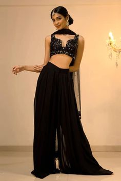 Buy Black Georgette Solid Pleated Pant Set With Mirrorwork Blouse For Women by Foram Patel Online at Aza Fashions. Evening Palazzo Set With Sheer Dupatta And Traditional Drape, Evening Floor-length Palazzo Set With Mirror Work, Festive Evening Sharara With Mirror Work, Embellished Georgette Sharara For Evening, Evening Sharara With Sheer Dupatta In Georgette, Evening Party Wear Georgette Palazzo Set, Elegant Sequined Palazzo Set In Georgette, Bollywood Style Evening Sets With Dabka Work, Embellished Georgette Palazzo Set For Evening