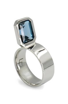 The label's signature perched setting holds an emerald-cut London blue topaz that offers drama to a polished band of 14-karat white gold. 14k gold/London blue topaz Made in the USA London Blue Topaz Ring, London Blue Topaz, Blue Topaz Ring, London Blue, Topaz Ring, Emerald Cut, Blue Topaz, Topaz, Emerald