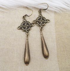 Bronze Celtic Knot Metal Earring, Dark Antiqued Brass Long Statement Earring, Viking Aesthetic, Ren Faire Jewelry, Unique Gift For Friend Bronze Antique Finish Dangle Earrings, Bronze Antique Finish Drop Earrings, Antique Gold Drop Earrings With Antique Finish, Antique Bronze Metal Earrings, Bronze Long Drop Metal Earrings, Bronze Brass Long Drop Earrings, Antique Gold Copper Earrings With Antique Finish, Antique Finish Metal Earrings, Antique Gold Metal Earrings With Antique Finish