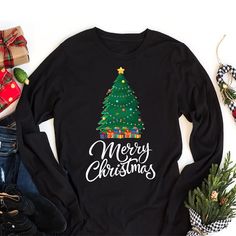 Classic Fit Merry Christmas Long Sleeve T-Shirt, Christmas Family Unisex Long Sleeve Shirt, Christmas Shirt For Kids, Xmas Shirt, Christmas Shirt. 8 Oz./Yd² (Us) 13.3 Oz./L Yd (CA), 50/50 Preshrunk Cotton/Polyester Heather Sport Colors: 60/40 Polyester/Cotton Safety Green: Compliant With ANSI / ISEA 107 Air Jet Yarn for Softer Feel and Reduced Pilling Double-Needle Stitching at Shoulders, Armholes, Neck, Waistband, and Cuffs 1x1 Rib With Spandex for Enhanced Stretch and Recovery Merry Christmas Family Shirt Grey Pearlized Tear Away Label Merry Christmas Long Sleeve T-Shirt, Christmas Family Unisex Long Sleeve Shirt, Christmas Shirt For Kids, Xmas Shirt, Christmas Shirt. High-Quality Air Jet Yarn for Softer Feel and Reduced Pilling. Double-Needle Stitching at Shoulders, Armholes, Neck, Wais Black Long Sleeve Christmas T-shirt, Black Long Sleeve Christmas Shirt, Festive Long Sleeve T-shirt For Holiday, Festive Long Sleeve Holiday T-shirt, Festive Long Sleeve Christmas T-shirt, Festive Long Sleeve Cotton T-shirt, Long Sleeve Christmas Holiday Shirt, Black Long Sleeve Holiday Shirt, Long Sleeve Shirt For Christmas Gift