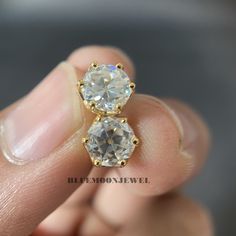 𝐒𝐭𝐨𝐧𝐞 𝐃𝐞𝐭𝐚𝐢𝐥𝐬 ➤ 𝐓𝐲𝐩𝐞: Moissanite ➤ 𝐂𝐮𝐭: Old European Round ➤ 𝐂𝐨𝐥𝐨𝐮𝐫: EF ➤ 𝐂𝐥𝐚𝐫𝐢𝐭𝐲: VVS1 ➤ 𝐖𝐞𝐢𝐠𝐡𝐭: 1.00 CT (each) - Total 2.00 CT 𝐃𝐞𝐭𝐚𝐢𝐥𝐬 At BlueMoon Jewels, we use only the highest quality materials to craft our beautiful jewelry. Our pieces are made with solid gold in your choice of 10k, 14k, or 18k purity, or with 925 sterling silver. We offer a range of metal tones, including classic white, romantic rose, and warm yellow, to suit every taste and style. In addition to using only the finest materials, we are also committed to producing pieces that are of the highest quality and craftsmanship. To ensure the authenticity of our jewelry, every piece is stamp or hallmarked. This means that it has been officially tested and certified to meet the sta Round Cubic Zirconia Diamond Earrings For Anniversary, Moissanite Bridal Earrings With Diamond Accents, Bridal Earrings With Diamond Accents In Moissanite, Round Moissanite Bridal Earrings With Diamond Accents, Wedding Diamond Earrings In Diamond White With Vvs Clarity, Cubic Zirconia Round Cut Bridal Earrings For Anniversary, Diamond Wedding Earrings With Round Stone, Cubic Zirconia Bridal Earrings For Anniversary, Wedding Diamond Earrings With Round Stone