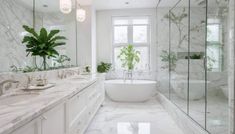 a white bathroom with marble counter tops and bathtub next to a large window that has plants in it