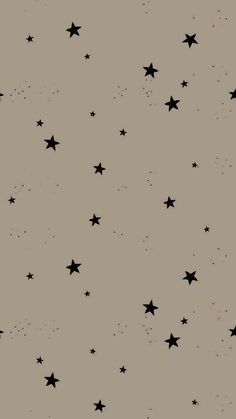 black stars are scattered on a gray background