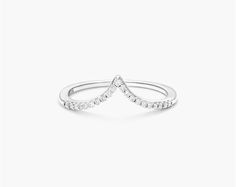 14K White Gold Deep V Diamond Ring. Add a touch of romance to any ring with this stunning deep V diamond ring. This design creates a frame and adds sparkle to your rings. Stackable Diamond Rings With Vvs Clarity, Diamond Stackable Rings With Vvs Clarity And Open Band, Stackable Diamond Rings With Vvs Clarity And Open Band, Elegant 14k White Gold Stackable Rings, Diamond Stackable Rings With Brilliant Cut And Open Band, Luxury Diamond Halo Stackable Rings, Elegant Stackable Rings With Vvs Clarity For Anniversary, Elegant White Gold Cubic Zirconia Stackable Rings, Elegant White Gold Stackable Rings With Cubic Zirconia