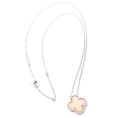 Van Cleef & Arpels Alhambra 18k White Gold Pink Opal Pendant Necklace       Metal: 18k white gold  Length: 16.75", 15"  Weight: 5.5 grams  Stones: 1 alhambra shape pink opal 15mm  Hallmarks: VCA 750 BL68XXX(serial number omitted)  Please reference the dimensions in the description for the best approximate dimensions. Luxury White Diamond Necklace With Flower Pendant, Luxury White Diamond Clavicle Necklace, Luxury White Diamond Necklace With Clavicle Chain, Luxury White Necklaces With Polished Finish, Luxury White Gold Diamond Necklace With Clavicle Chain, Luxury White Diamond Necklace With Polished Finish, Luxury White Flower Pendant Jewelry, Luxury Hallmarked Rose Gold Diamond Necklace, Luxury White Gold Sterling Silver Necklace