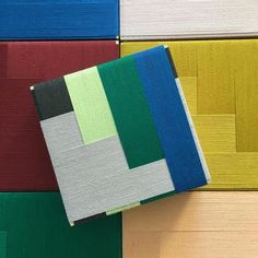 several different colors of fabric on top of each other