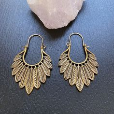 Gold feathered earrings, Boho hoop earrings, Large feather shaped earrings, Antique golden leaf hoops, Bohemian tribal earrings ❤️Boho your way! Thanks for stopping by! We have many unique items here, please take a moment to visit! -Your order will be shipped out within 2 business days after the order has been received. -These earrings are light weight and easy to wear, perfect for your daily look. -They're designed with different geometric shapes like circle, triangle, diamond, teardrop etc, they can show your personality in different styles. -These earrings are also perfect gifts for friends and families, the exquisite accessory for women.  -They fit all of your fashion needs, for any formal and informal occasions, such as party, vacation, prom, wedding, birthday and anniversary, holiday Vintage Metal Hoop Earrings For Summer, Summer Vintage Metal Hoop Earrings, Bohemian Bronze Hoop Earrings, Bohemian Hoop Cartilage Earrings For Festival, Bohemian Metal Dangle Hoop Earrings, Vintage Gold Hoop Earrings For Summer, Bohemian Metal Hanging Hoop Earrings, Bohemian Hoop Cartilage Earrings, Bohemian Gold Cartilage Earrings For Festivals