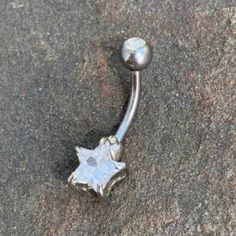 Star Belly Button Navel Ring. Crystal Star At Bottom End. Top Ball Closure Has A Crystal In It Too. Surgical Steel. 14 G. New Without Tags, Never Used. Penny For Scale. Navel Jewelry Unique, Star Belly Button Ring, Belly Button Rings Silver, Star Belly Button Piercing, Bellybutton Ring, Belly Piercing Jewelry, Piercing Inspo, Button Piercing, Belly Button Jewelry