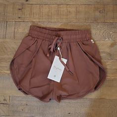 Buffbunny Collection Womens Mocha Lifesaver Shorts, Size Xxs, Never Worn With Tags Cute Brown Bottoms For Spring, Trendy Brown Bottoms For Loungewear, Cute Brown Spring Bottoms, Trendy Brown Loungewear Bottoms, Brown Shorts With Elastic Waistband For Loungewear, Brown Bottoms With Built-in Shorts For Loungewear, Brown Loungewear Bottoms With Built-in Shorts, Loungewear Bottoms With Built-in Shorts In Brown, Brown Short Bottoms For Loungewear