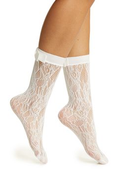 A neat bow decorates the back of delicate lace socks that were designed to make an elegant statement. Nylon/spandex Hand wash, dry flat Imported Lace Socks With Heels, White Lace Socks, Socks With Heels, Lace Socks, Crew Socks, White Lace, High Heel, Coco, High Heels