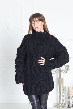 "MATERIAL : 2 strands of 100 % soft wool COLOUR : Black ( There may be a slight difference because of the different monitors' representation) ♥ In the picture the model is wearing a garment with these measurements : A: ( Body lenght) : 27.6 \" / 70 cm B: ( Chest width) : 17.7 \" / 45 cm C: (Sleeve from under the arm) : 22.4 \" / 57 cm D: (Neck unrolled) : 6.3 / 16 cm. They are taken with the item laid flat and not streched. ♥ For choosing your size please look at size chart in our listing pictur Black Merino Wool Long Sleeve Sweater, Black Long Sleeve Merino Wool Sweater, Black Chunky Knit Turtleneck Sweater, Black Chunky Knit High Neck Sweater, Black Wool Long Sleeve Sweater, Black Knit Sweater For Cold Weather, Black Turtleneck Cable Knit Sweater, Black Wool Sweater For Cold Weather, Winter Black Knitting Pattern