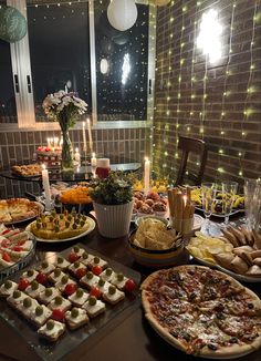 a table filled with lots of different types of food