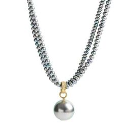 Natural South Sea Tahitian Pearl And Diamond Pendant with 22K Gold bail and Double Grey Pearls Strand Necklace. ----------------- 22K pendant with diamond bail. 12mm Tahitian pearl drop on double freshwater strand. Length 49 cms, with 22K clasp and ends. Beautiful classic necklace can be worn with T shirt and Jeans and perfect for Cocktails! ------------------ See more of our pearl jewelry here: https://www.etsy.com/il-en/shop/PamelaHarari?ref=seller-platform-mcnav&section_id=40150707 See the re South Sea Pearl Necklace, Grey Pearl Necklace, Tahitian Pearl Necklace, Pearl Strands Necklace, Classic Necklace, Sea Pearl, Pearl Strands, Tahitian Pearls, South Sea Pearls