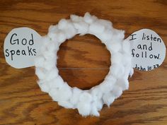 two pieces of paper that have been made to look like a wreath with the words god speaks written on them