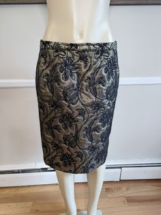 "This 1980s gold and black handmade skirt is sophisticated and chic with a timeless elegance. Would fit a modern US size 12-14. Measurements taken flat are: W: 16.5\" H: 20.5\" L: 23.5\"" Elegant Gold Lined Skirt, Elegant Gold Mini Skirt, Gold Pencil Skirt For Party, Gold Fitted Chic Skirt, Gold Pencil Skirt For Night Out, Gold Lined Skirt, Gold Lined Skirt For Party, Gold Lined Pencil Skirt, Black Floral Skirt