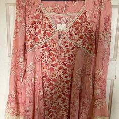 Extremely Cute Free People Boho Dress Pink And Cream Pink Long Sleeve Maxi Dress For Vacation, Pink Printed Feminine Mini Dress, Pink Flowy Long Sleeve Dress, Spring Pink Maxi Dress With Lace Trim, Pink V-neck Boho Sundress, Pink Fitted V-neck Boho Dress, Fitted Pink V-neck Boho Dress, Summer Long Sleeve Pink Boho Dress, Pink Midi Dress With Lace Trim For Beach