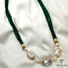 Description Material: Emerald / Pearls / Brass Dimensions: ca.85 cm Item number: 10183 This emerald necklace is handmade and suitable for daily wear and for special occasions. The design of the necklace emphasizes the elegance and taste of the owner. Gold and silver jewelry is our passion, which we love and live. A look at our Etsy shop for many more beautiful pieces of jewelry is worthwhile. We regularly expand our portfolio in order to always be able to offer you new favorite pieces. Among the Necklace With Emerald, Gold And Silver Jewelry, Emerald Necklace, Multi Strand Necklace, Strand Necklace, Multi Strand, Item Number, Gold And Silver, Personalized Jewelry