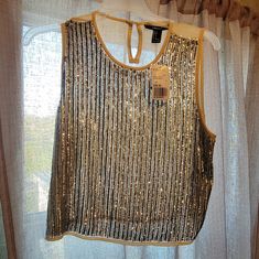 A Gunmetal Beaded Sleeveless Blouse By Forever Xxi. The Slightly Cropped Front Is Beaded With Silver Grey Beads. The Back Of This See Through Blouse Is Cream And Has A Key- Hole Closure With A Silver Button. This Top Would Look Great With Wide Leg Black Pants For A Cocktail Look. You Could Rock This Top With A Cami Or Bra Under It. It Would Look Great With A Leather Jacket And A Pair Of Jeans For A Date Night. Reasonable Offers Accepted. Plus Size Bohemian, Black Peplum Top, Doll Blouse, Bell Sleeve Crop Top, White Floral Top, Beige Blouse, Brown Blouse, Beaded Blouse, Black Peplum