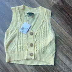 Women’s Sweater Vest/Sweater Top. Yellow. Button Details. Size Small Casual Sweater Vest With Buttons, Spring Knit Sweater Vest With Button Closure, Knit Sweater Vest With Button Closure For Spring, Spring Knit Sweater Vest With Buttons, Trendy Cable Knit Sweater Vest For Spring, Trendy Spring Cable Knit Sweater Vest, Spring Casual Sweater Vest With Buttons, Casual Sweater Vest With Buttons For Spring, Casual Spring Sweater Vest With Buttons