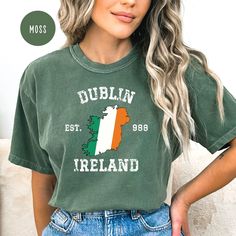 Dublin Ireland Grunge Style Comfort Colors® T-Shirt, Dublin Vacation Gift Shirt, Ireland Travel Shirt, Ireland Flag Tee, Ireland Gift Shirt. Orders are processed within 24 hours and shipped out within 2 to 5 business days. What you receive Comfort Colors® Adult Unisex Crewneck T-shirt Color Choices: Ivory Bay Berry Light Green Mustard Blue Jean Blue Spruce Pepper Moss Sizes: Unisex adult sizing use size chart as a guide. These shirts are fitted and run true to size. If you prefer a loose fit go Fan Apparel Slogan Crew Neck Top, Fan Apparel Slogan Top, Slogan Crew Neck Top For Fans, Fan Apparel Soft-washed Crew Neck T-shirt, Soft-washed Crew Neck Fan T-shirt, Soft-washed Crew Neck T-shirt For Fan Apparel, Soft-washed Crew Neck T-shirt For Fans, Green Fan Apparel T-shirt With Letter Print, Crew Neck College Slogan Shirt