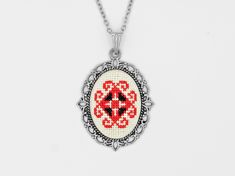 "Beautiful hand embroidered necklace, with a traditional Romanian red and black motif. Perfect for everyday wear or a special occasion. Perfect gift for girlfriend or wife * Pendant: 2.8 cm x 3.8 cm  * Stainless steel chain length: measures between 43 cm - 76 cm (17\"-30\") depending on your choice (You can choose your desired necklace length from the drop-down menu. Leave a note at checkout for any custom length. ) Your jewelry comes in a beautiful gift box which means it is ready for gift giving. I can include a handwritten card with your order. Simply tick the \"Add gift message for free\" box during checkout and write your message in the box below it. Although I make every effort to photograph items accurately, I cannot guarantee every computer monitor will accurately depict the actual Hand Embroidered Necklace, Poppy Necklace, Perfect Gift For Girlfriend, Embroidered Necklace, Red Pendants, Red Necklace, Black Pendant, Christmas Gift Jewelry, Bohemian Earrings