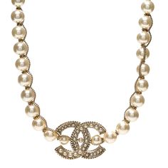 This is an authentic CHANEL Metal Pearl Chain CC Long Necklace in Gold. This elegant necklace is a long strand of fine various sized faux pearls separated by gold links and pearl-set Chanel CC logo. 1334103 Luxury Long Chain Necklace With Pearl Pendant, Luxury Pearl Chain Dangle Necklaces, Luxury Long Necklace With Pearl Chain, Luxury Glamorous Pearl Chain Jewelry, Luxury Long Pearl Chain Necklace, Long Necklace Gold, Gold Long Necklace, Elegant Necklace, Cc Logo