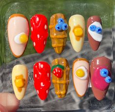 Orange Seashell Nails, Japanese Themed Nails, Breakfast Nail Art, Mystery Machine Nails, Nails With Checkered Design, Fruit On Nails, Pancake Nails, Fruit Salad Nails, Quirky Nail Designs