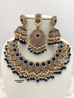 Antique Gold Polki Necklace Set comes with Jhumki earrings and tikka / Indian Jewelry/ High Quality Kundan and Polki Jewelry/ Bollywood Jewelry/Wedding/Navy blue  All items are shipped from Brampton, Ontario, Canada. If you need your item by a certain day, please reach out to us for express delivery option before placing the order so that we can update the shipping for you. Standard shipping/delivery timeline Below are the delivery timeline estimates once the order ia shipped ---> USA delivery t Blue Temple Jewelry Set With Meenakari, Blue Meenakari Temple Jewelry Set, Blue Chandbali Kundan Necklace Bollywood Style, Blue Chandbali Kundan Necklace, Bollywood Blue Bridal Necklace Hand Set, Heavy Blue Bridal Necklace For Diwali, Blue Kundan Necklace Bollywood Style For Festivals, Blue Kundan Chandbali Bridal Necklace, Blue Chandbali Kundan Necklace For Festive Occasions